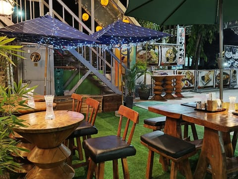 Outdoor seating at Daitoku Ramen, patio evening, Angeles City