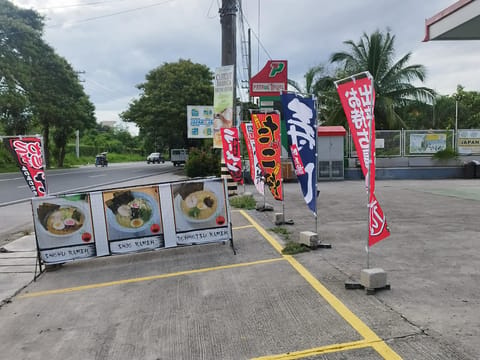 Daitoku Ramen storefront, roadside banners, on Friendship Highway in Angeles City