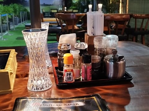 Outdoor seating at Daitoku Ramen, table setting, Angeles City