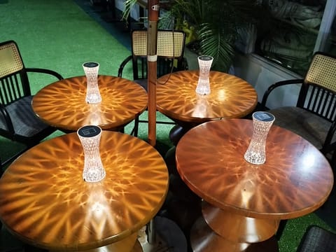 Outdoor seating at Daitoku Ramen, patio tables, Angeles City