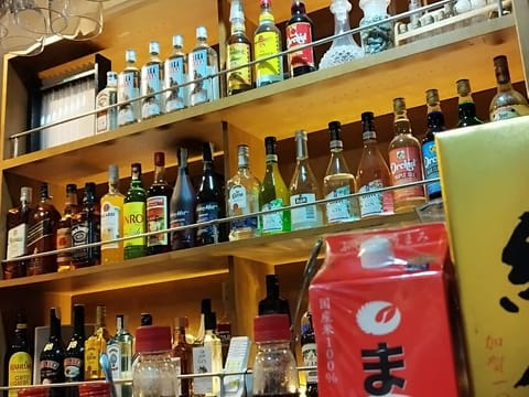 Inside Daitoku Ramen, sake shelf, Angeles City